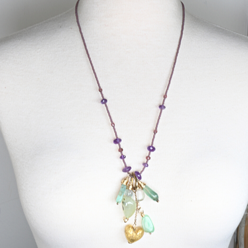Long beaded necklace with multiple pendant charms in amethyst, fluorite, chrysoprase and prehnite stones. Designed and handcrafted by Ula Frou creator Sadie Hodson on Salt Spring Island.